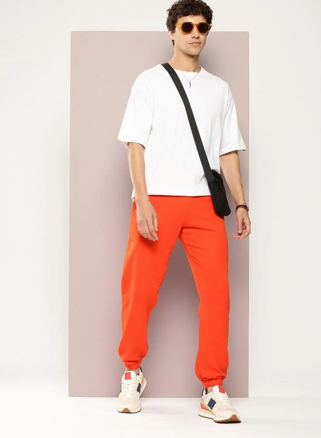 Dillinger Men Orange Solid Joggers